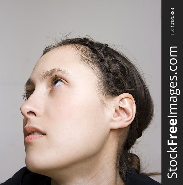 Close up profile portrait of young starry-eyed woman. Close up profile portrait of young starry-eyed woman