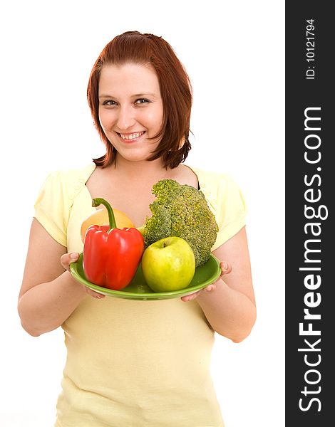 Woman eating vegetables on white background