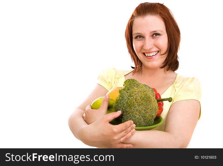 Woman eating vegetables on white background