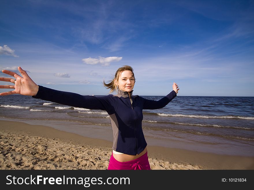 Active woman running on the beach. Active woman running on the beach