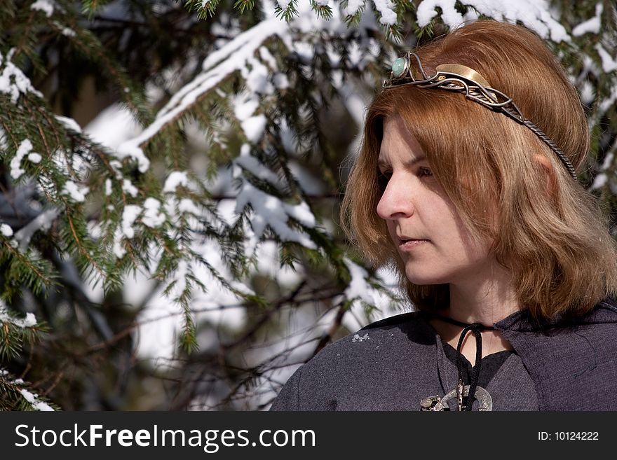 Girl in gray dress and snow tree. Girl in gray dress and snow tree