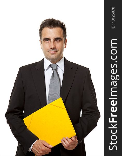 Businessman holds a yellow file from his office
