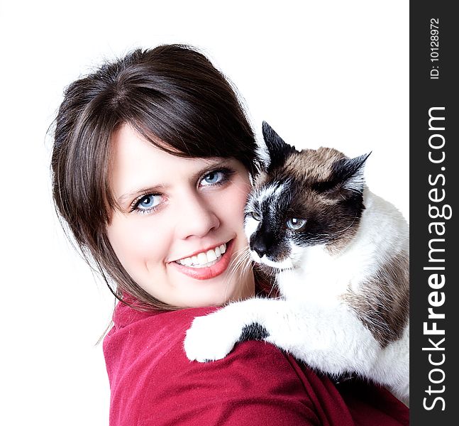 Woman holding a cat in her arms, close-up, isolated on a white background. Woman holding a cat in her arms, close-up, isolated on a white background.