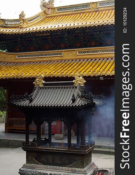 An ancient Chinese templeï¼Œ Worship of cigarettes increased slowly