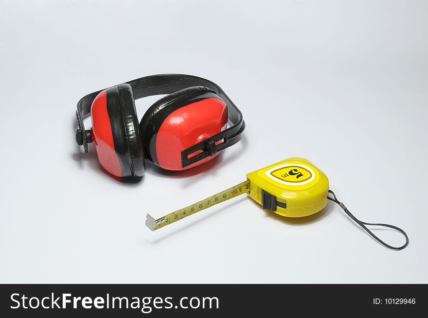 Ear protectors and tape measure. Ear protectors and tape measure.