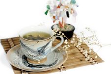 Cup Of Green Tea And Cash Isolated Tree On A White Stock Photography Cup Of Green Tea And Cash Isolated Tree On A White Stock Photography