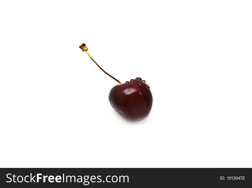 Fresh sweet cherry with drops on