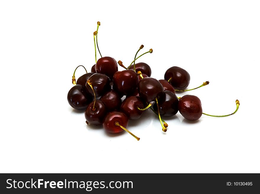 Fresh sweet cherries on white