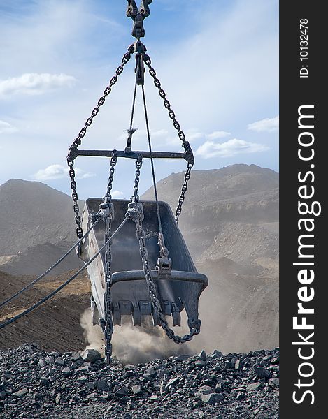 Huge metal bucket used for collecting coal at a coal site