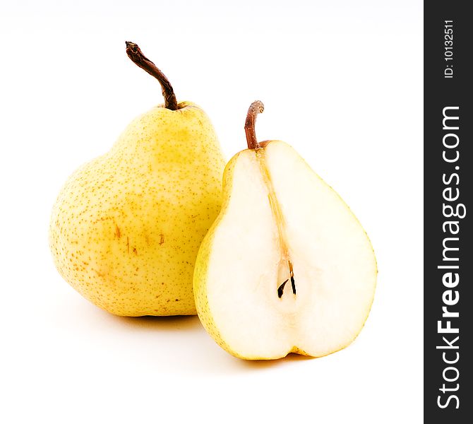 Yellow pear close-up isolated on white background