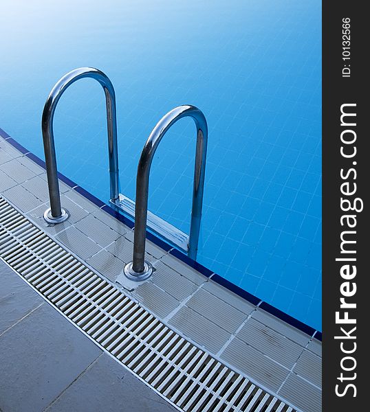 Blue water pool stair detail