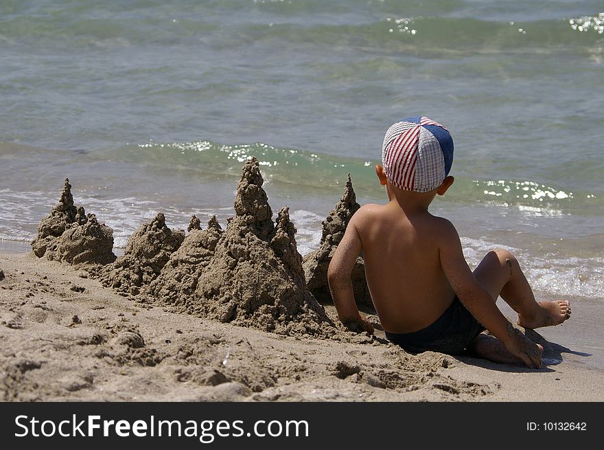 Sandy palace on the shore of the sea