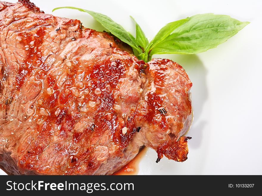 Juicy beef steak with oregano leaf