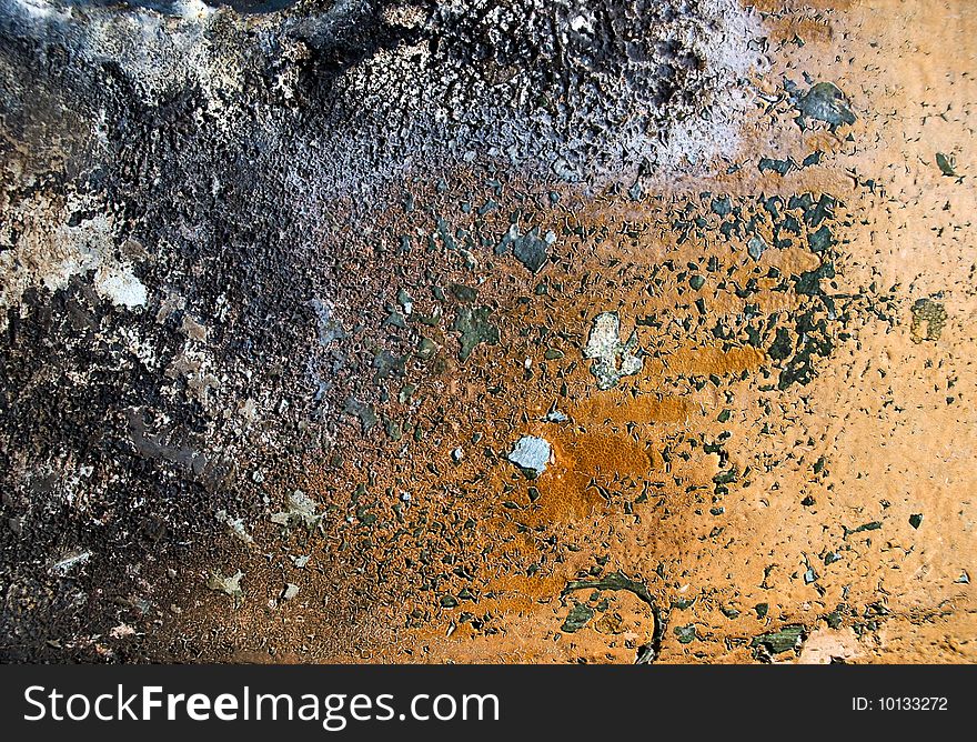 Abstract grunge background from weathered painted, stained, scratched and burned surface of metal. Abstract grunge background from weathered painted, stained, scratched and burned surface of metal