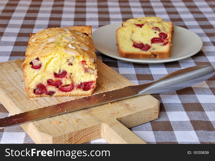A delicious cake with cherry. A delicious cake with cherry