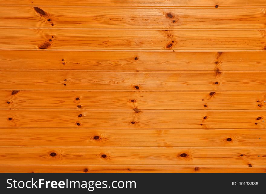 New polished orange wooden texture. New polished orange wooden texture