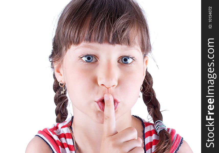 Portrait of funny lovely little girl  with her Finger to her Mouth - Shhhhh


, studio shot. Portrait of funny lovely little girl  with her Finger to her Mouth - Shhhhh


, studio shot