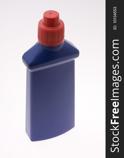 Blue bottle with red cap