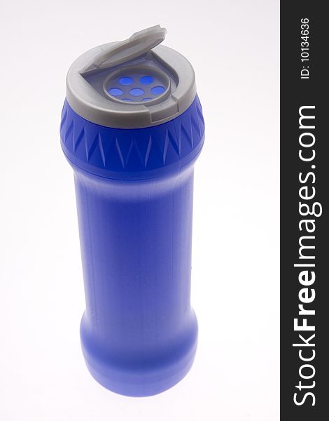 Blue plastic bottle with opened cap. Blue plastic bottle with opened cap