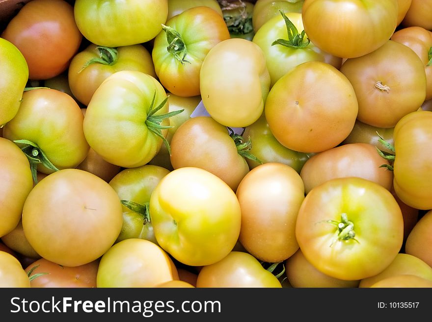 Crop of tomatoes in a box.