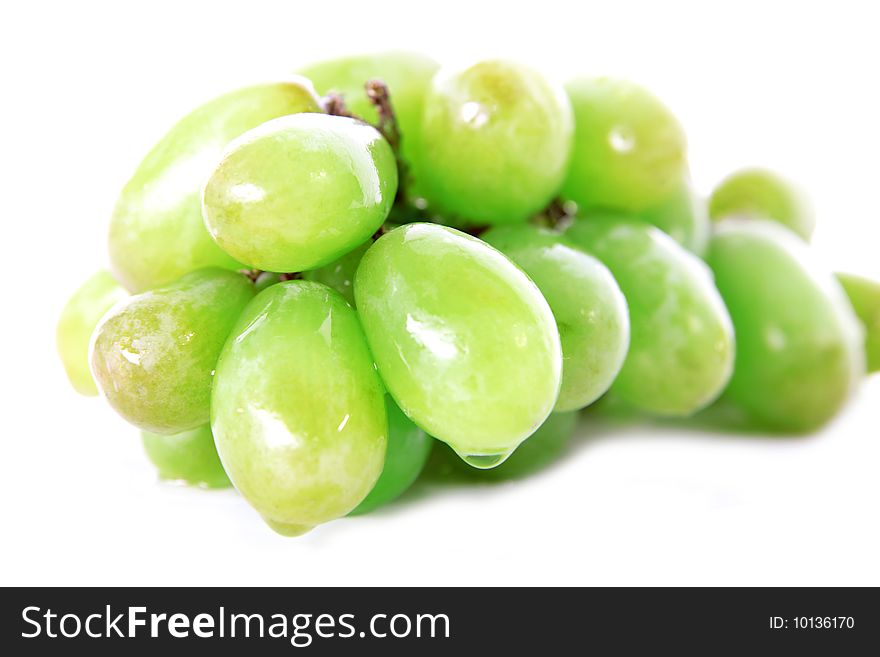 Fresh green grape isolated on white