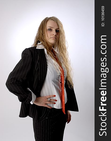 Business women looks angry, mad or disappointed. She wears black jacket, white short and red tie. Business women looks angry, mad or disappointed. She wears black jacket, white short and red tie.