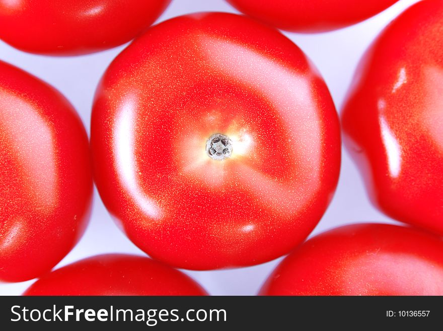 Red fresh tomato , close-up view