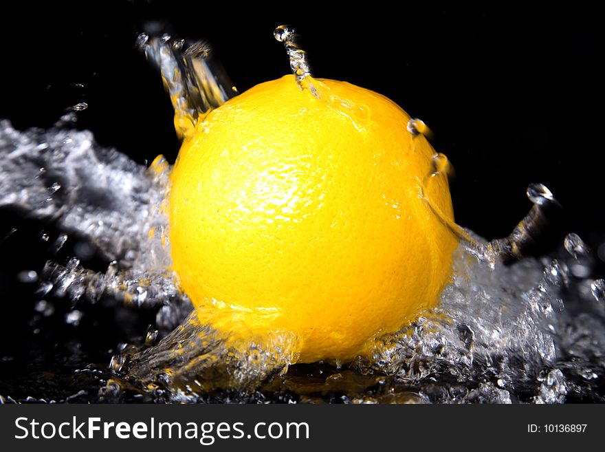 Fresh orange in water splash. Fresh orange in water splash