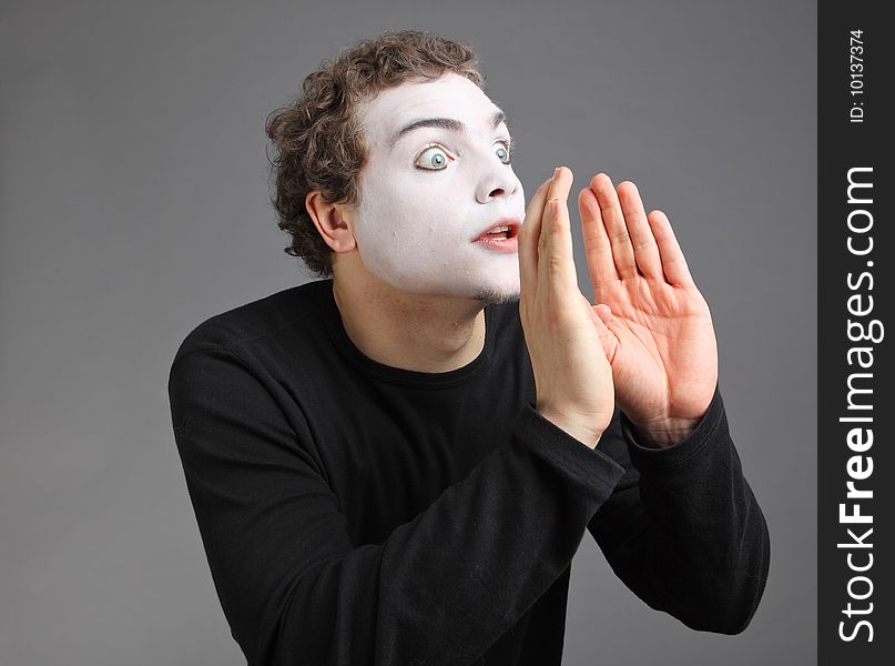 Portrait of the mime isolated on grey background