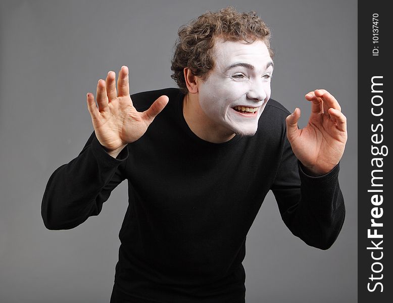 Portrait of the mime isolated on grey background