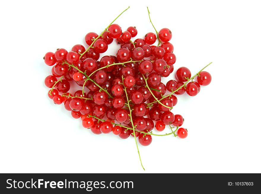 The heap of red currant on white