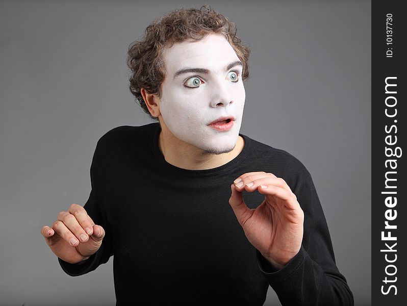 Portrait of the mime isolated on grey background