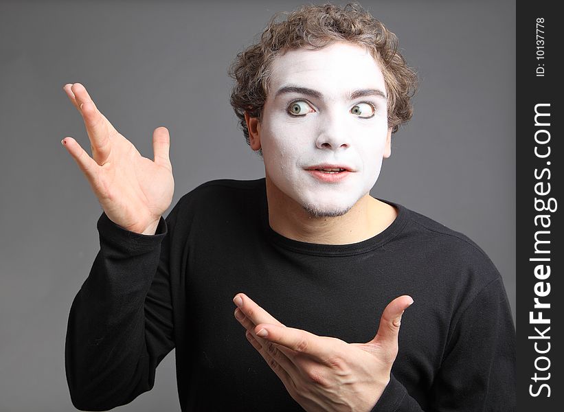 Portrait of the mime isolated on grey background