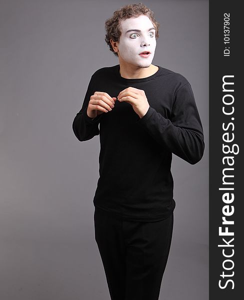 Portrait of the mime isolated on grey background