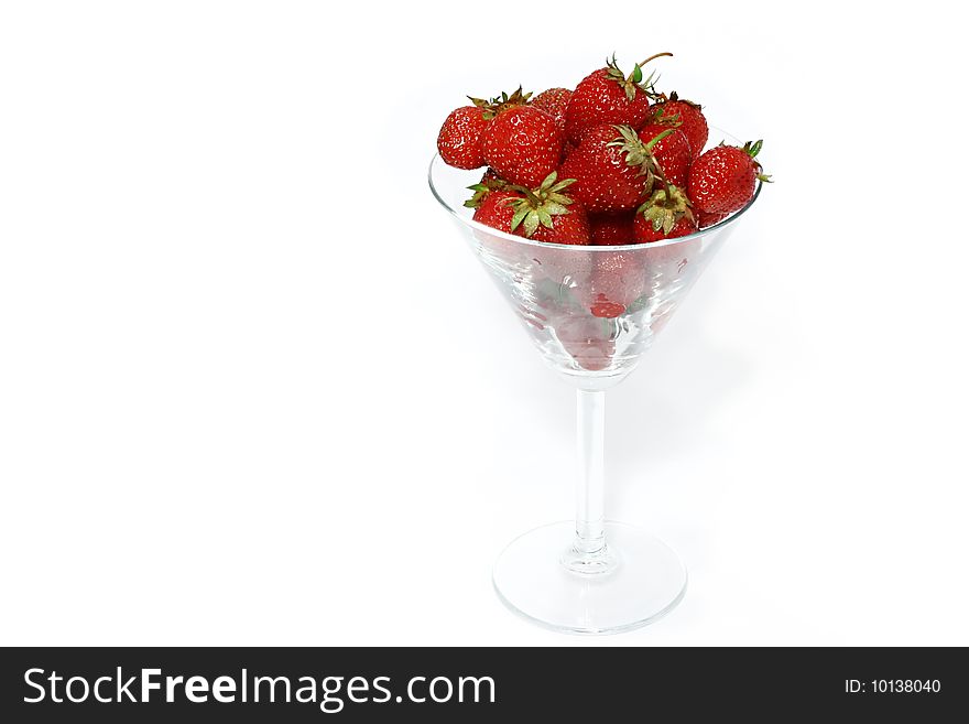 Strawberry in the glass isolated on a white