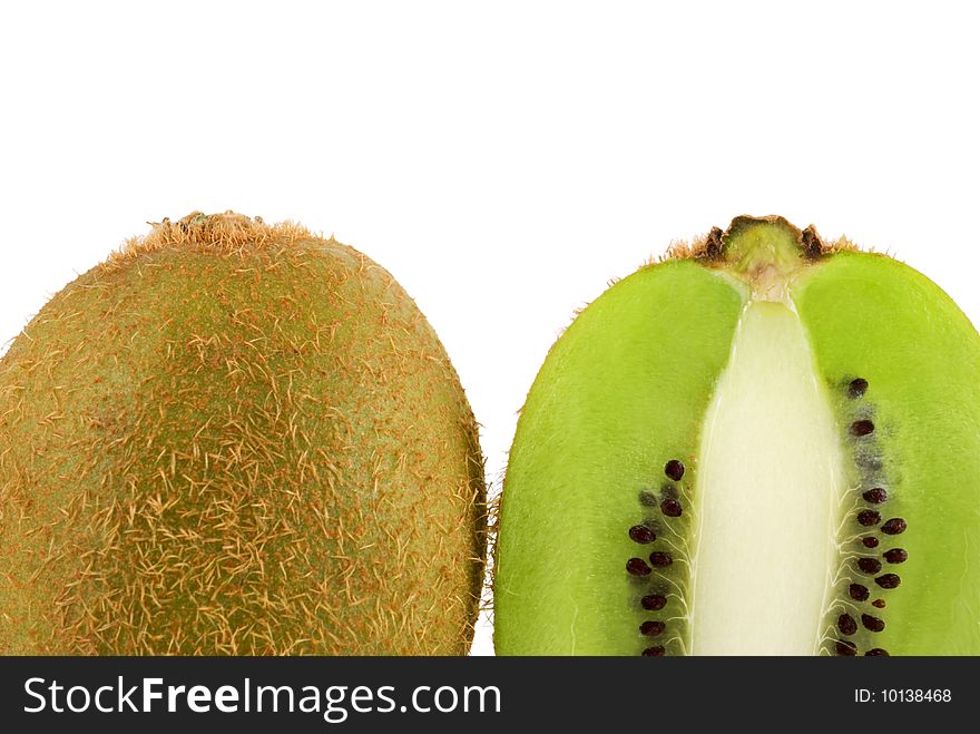 A vertically sliced kiwi fruit isolated on a white background