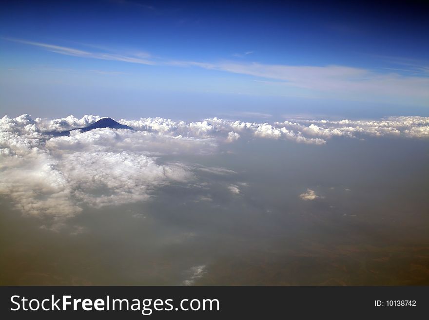 Beautiful view to the volcano from the airplane. Beautiful view to the volcano from the airplane