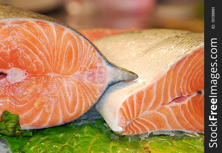 Close up of two half salmons in a market. Close up of two half salmons in a market