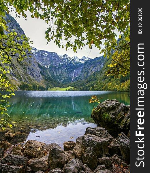 A mountain lake with a rocky coast.