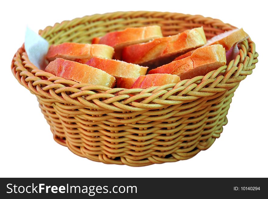 Bread in a basket on the isolated white background