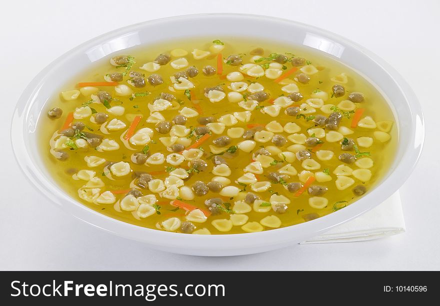 Chicken broth with vegetable and pasta. Chicken broth with vegetable and pasta
