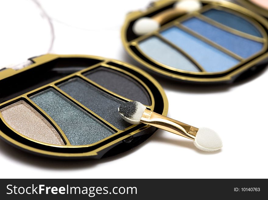 Blue and black make-up eyeshadows