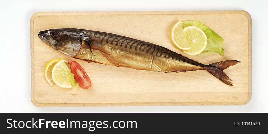 Smoked mackerel on a cutting board