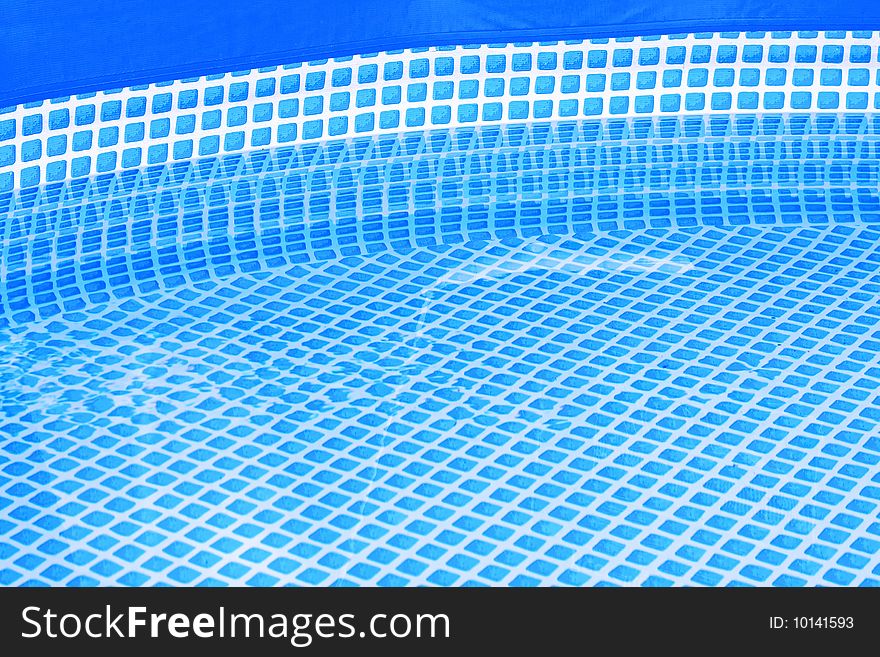 Interior shot of blue water swimming pool