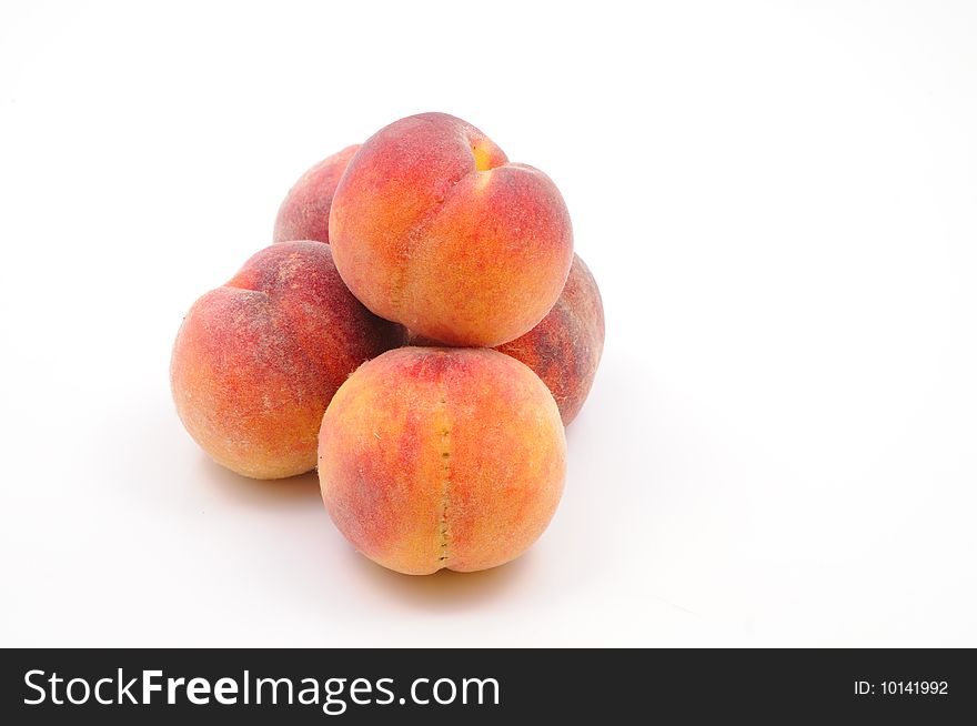 Several peaches isoolated on white background. Several peaches isoolated on white background