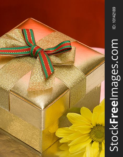 Gift box with yellow flower