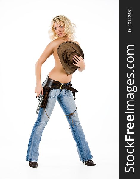 Young blonde woman in cowboy clothes with guns. Young blonde woman in cowboy clothes with guns
