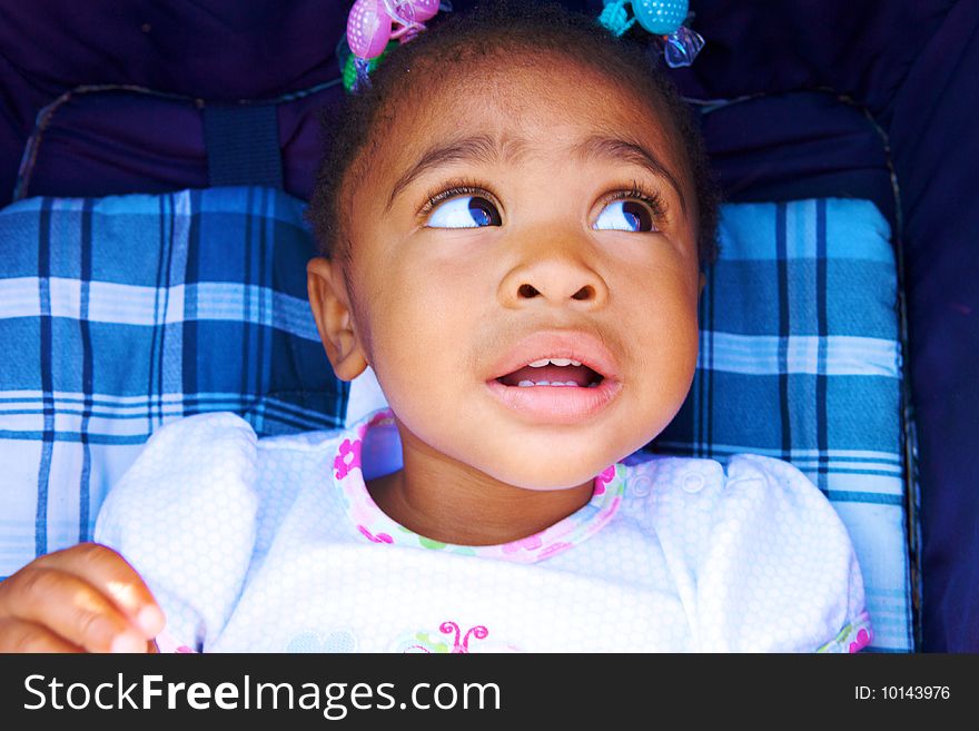 An adorable little African American Girl with Braids. An adorable little African American Girl with Braids