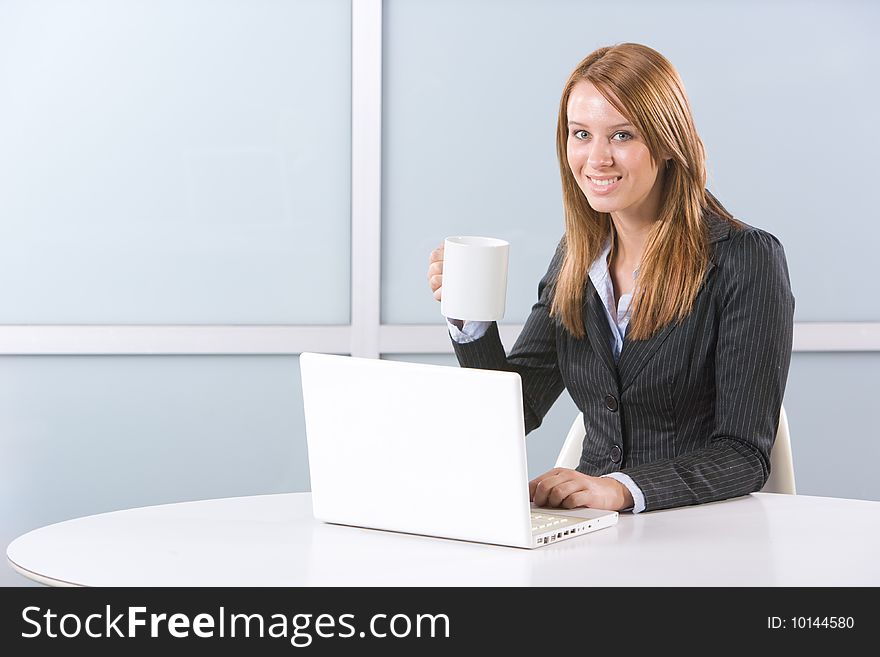 Business woman laptop in modern office