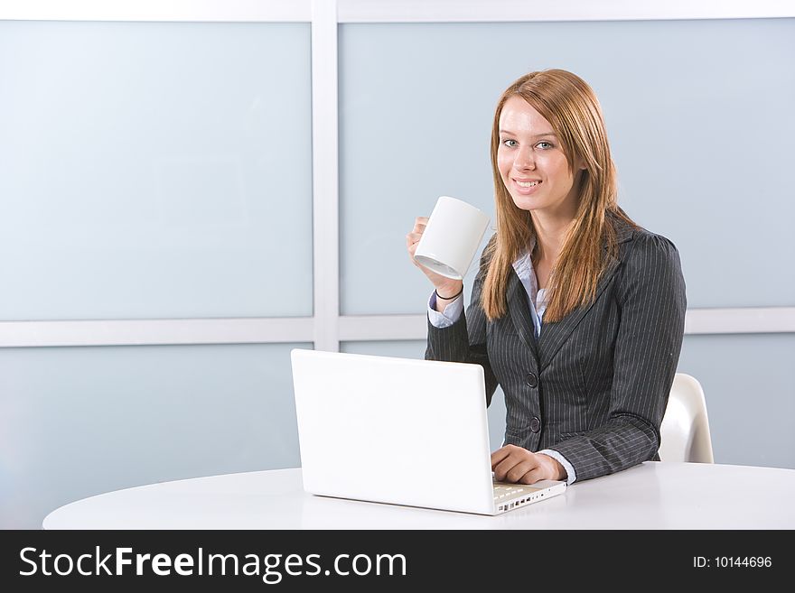 Business woman laptop in modern office